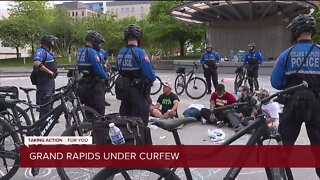 Calm night reported as Grand Rapids goes under curfew