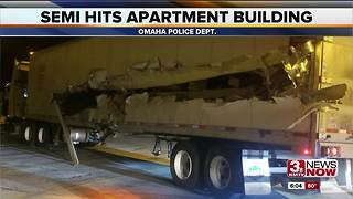 Semi truck hits apartment building on Pacific Street