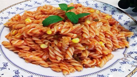 Pasta with tomato sauce and corn is a delicious and easy spaghetti