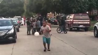 Officer plays with Detroit children