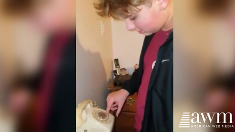 Mom Films Tech Savvy Son Attempting To Use A Rotary Phone, Goes Viral