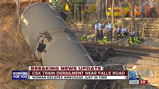 Woman escapes train derailment just in time