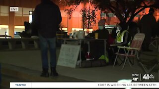 Protesters occupy City Hall