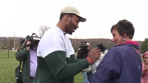 Myles Garrett speaks to the media at his puppy play date