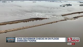 Iowa governor checks in on flood-damaged towns