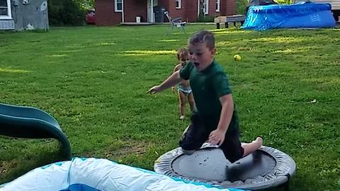 Young Boy Trips And Falls On His Face In A Kiddie Pool