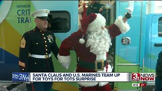Santa Claus and U.S. Marines team up for Toys for Tots surprise