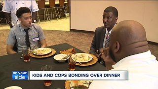 Kids and cops bond over dinner