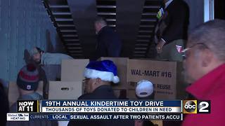 Officers and community organizations deliver toys to children