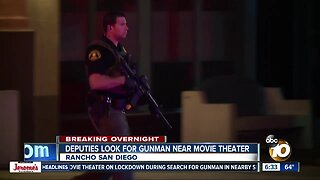 Movie theater locked down after shooting in parking lot