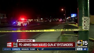 Armed man pointing gun at bystanders shot, killed by Phoenix police
