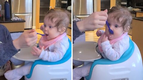 Baby's First Time Eating From A Spoon Is Absolutely Hilarious