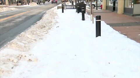 Snow leads to parking problems for Allen St. businesses under new parking design