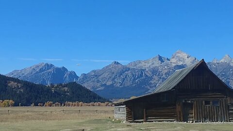 In Grand Teton National Park, watching a plane fly into Jackson Hole Airport