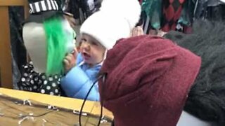 Fearless toddler confronted by Halloween clown