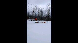 Bro hits some rails on skis