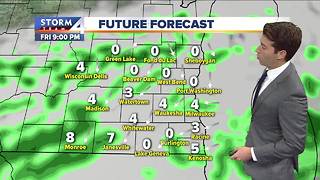 Mostly cloudy with scattered showers Friday