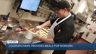 Restaurant managers prep meals for out-of-work staff