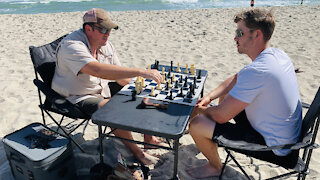 Beachgoers enjoy sun-filled beach on Thanksgiving