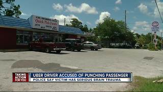 Uber driver accused of punching passenger