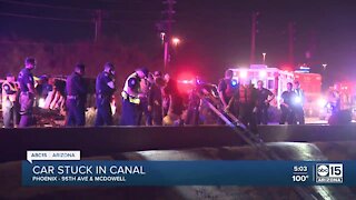 Firefighters rescue man after car plunges into canal in west Phoenix
