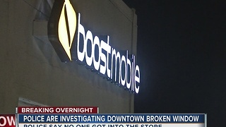 Tulsa Police investigate broken window at midtown real wireless store