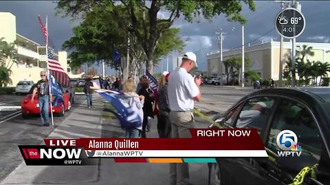 Local Haitians protest President Trump