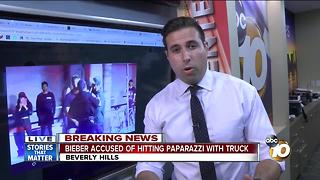 Bieber accused of hitting paparazzo with truck ++