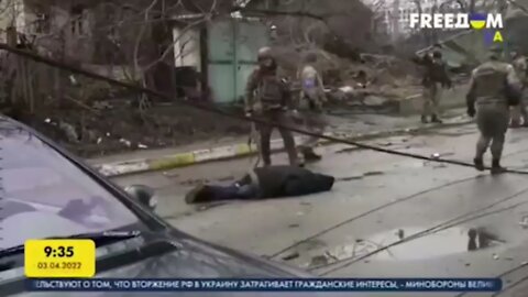 Ukrainian militants drag the corpses of civilians in Bucha to shoot a fake video