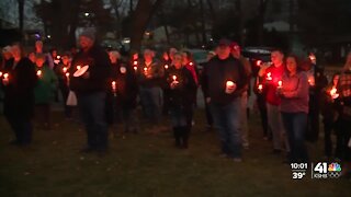 Family, friends hold candle light vigil for KCK woman killed on Christmas Eve