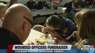 Money raised for wounded TPD officers