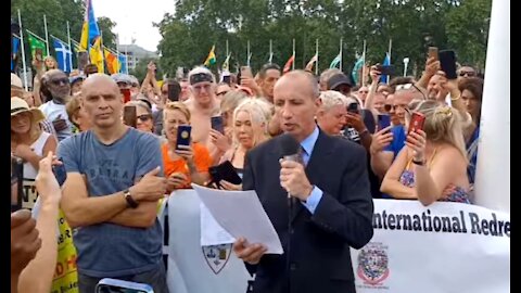 Mark Sexton speaks to the crowd outside Parliament on Freedom day