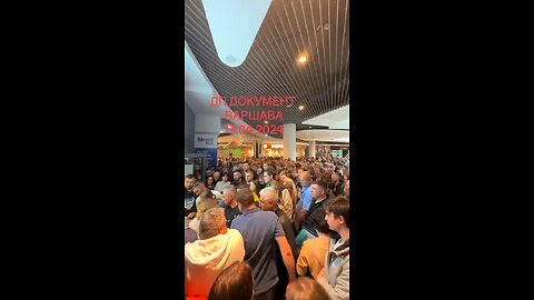 A line of Ukrainian citizens waiting for international passports in Warsaw.