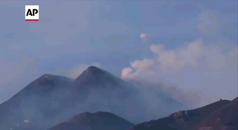 Italy's Mount Etna blows smoke rings.