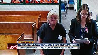 School employee hit disabled student, police say