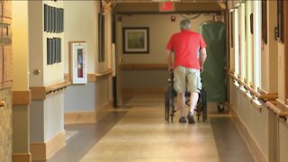 People visit loved ones at long-term care facility
