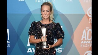 Carrie Underwood and Thomas Rhett make ACMs history as joint winners for Entertainer of the Year