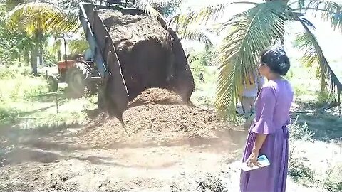 Truck unloading sand