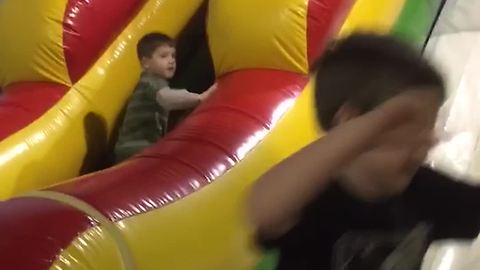 Tot Boy Trips On A Ball And Falls
