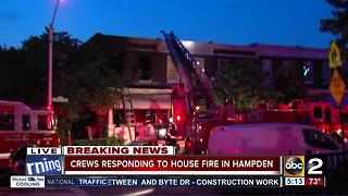 Firefighters injured battling row house fire in Hampden Wednesday morning