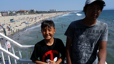 Happiness boys from Siberian in Santa Monica beach