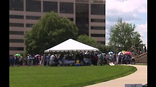 Serious car accident survivors rally in Lansing saying law puts lives at risk