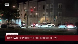 Protesters gather past curfew at 27th and Center