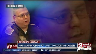 OHP captain pleads not guilty to extortion charges