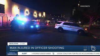 Officers open fire at arrestee armed with gun
