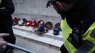 Met police think it's acceptable to put their riot helmets and shields on the Cenotaph