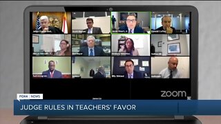Judge rules in teachers' favor