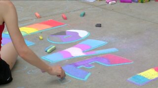 Bucks host 'Love Wins: Chalk the Plaza' at Fiserv Forum