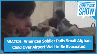 WATCH: American Soldier Pulls Small Afghan Child Over Airport Wall to Be Evacuated