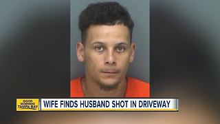 Man arrested after wife finds husband shot in driveway